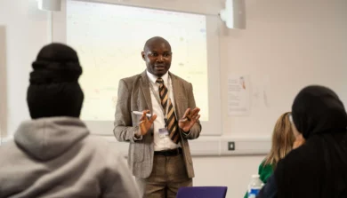 Accounting and Finance students with tutor in lecture