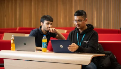 Two Applied Arts and Humanities students in lecture room