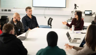 Counselling studies students in classroom discussion
