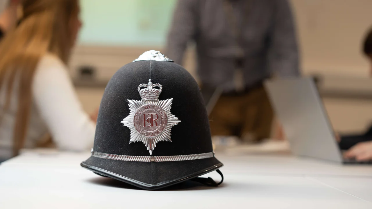 Police helmet on a desk