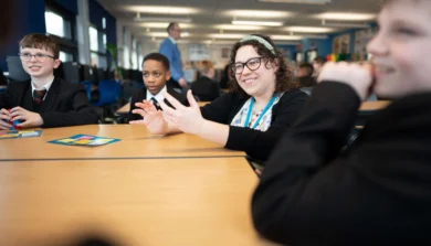 Secondary Education teacher in classroom with students
