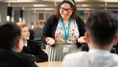 Secondary Education teacher in classroom with students