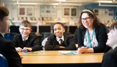 Secondary Education teacher in classroom with students
