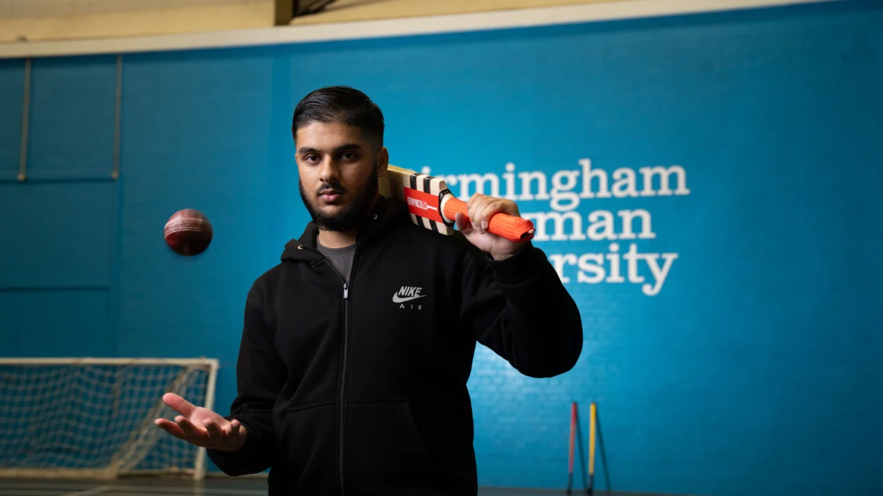 Sport student with cricket bat