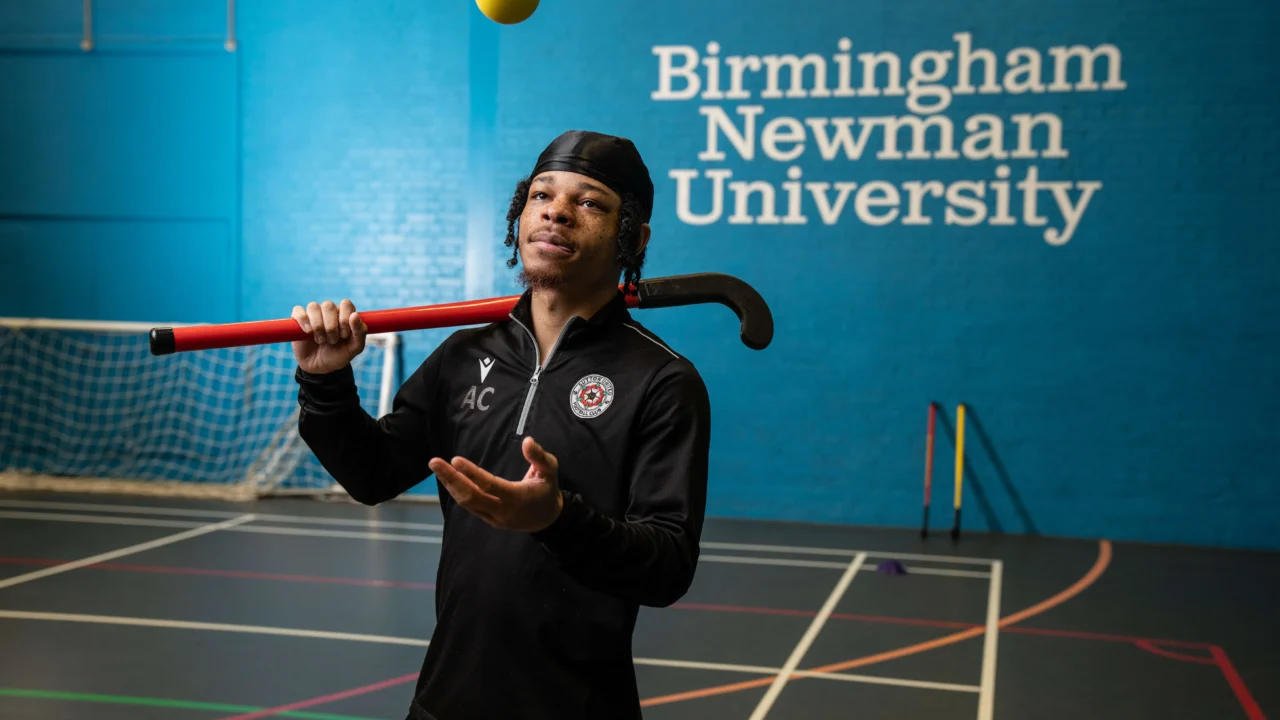 Sport student with hockey stick