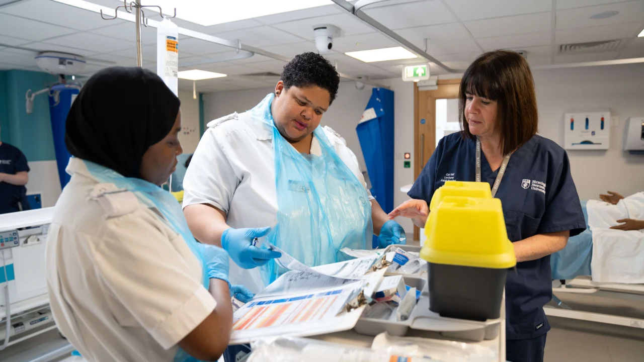 Mental Health Nursing students on a ward talking