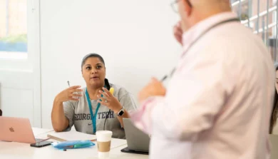 Student and lecturer interacting in Professional Practice in Counselling lesson