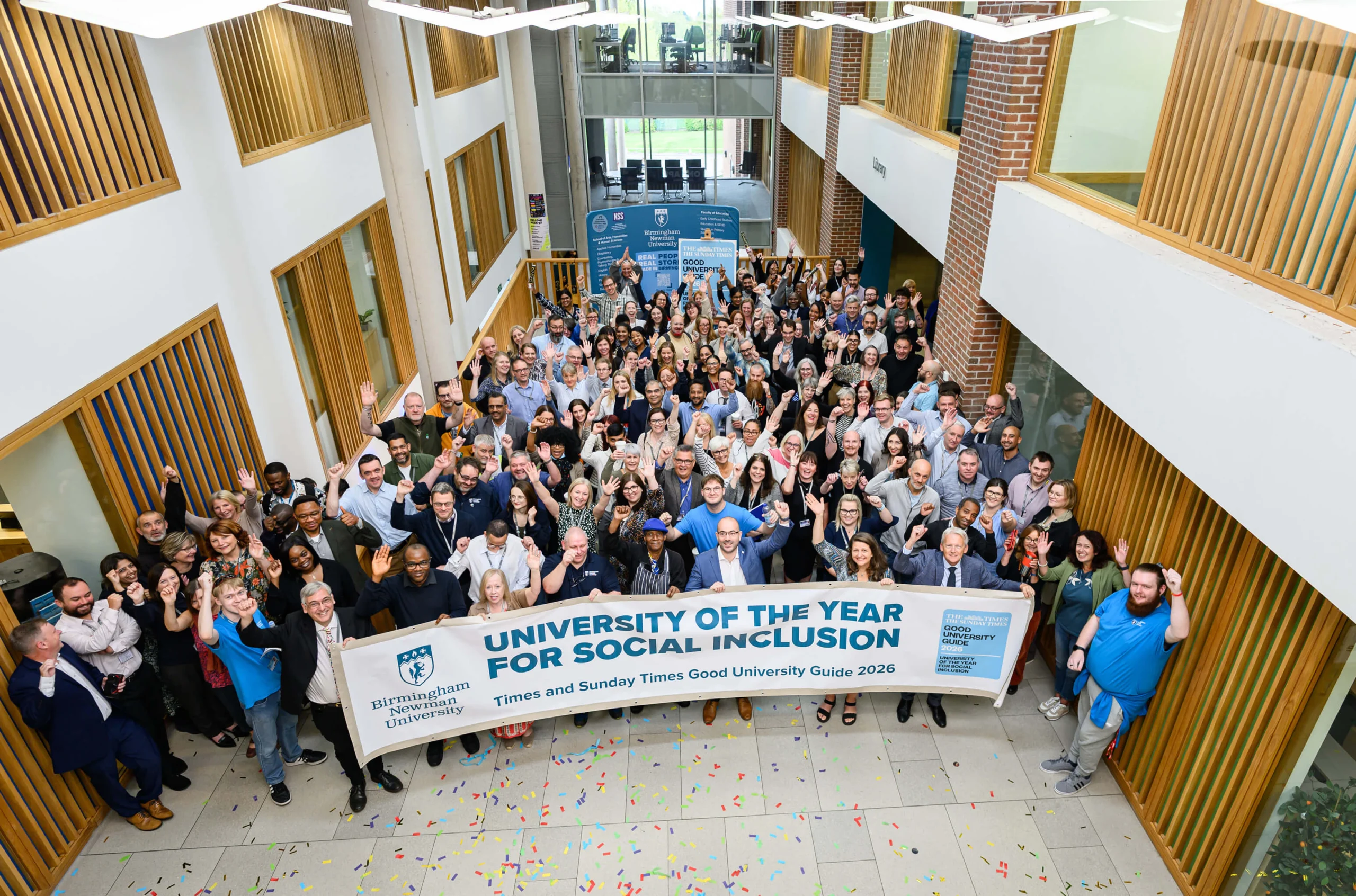 Staff celebrating University of the Year - Social Inclusion