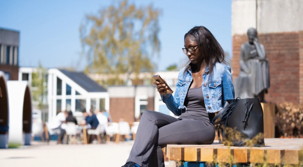 Student on mobile phone