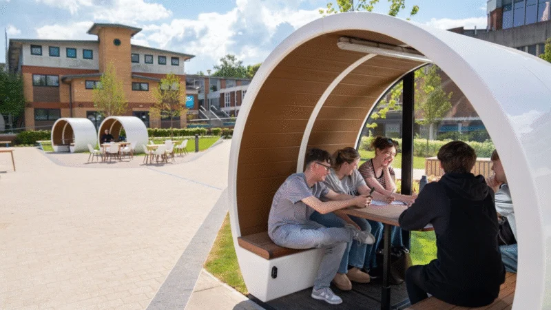 Students in a Quad booth socialising