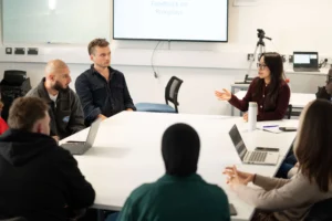 Counselling students in discussion during lesson