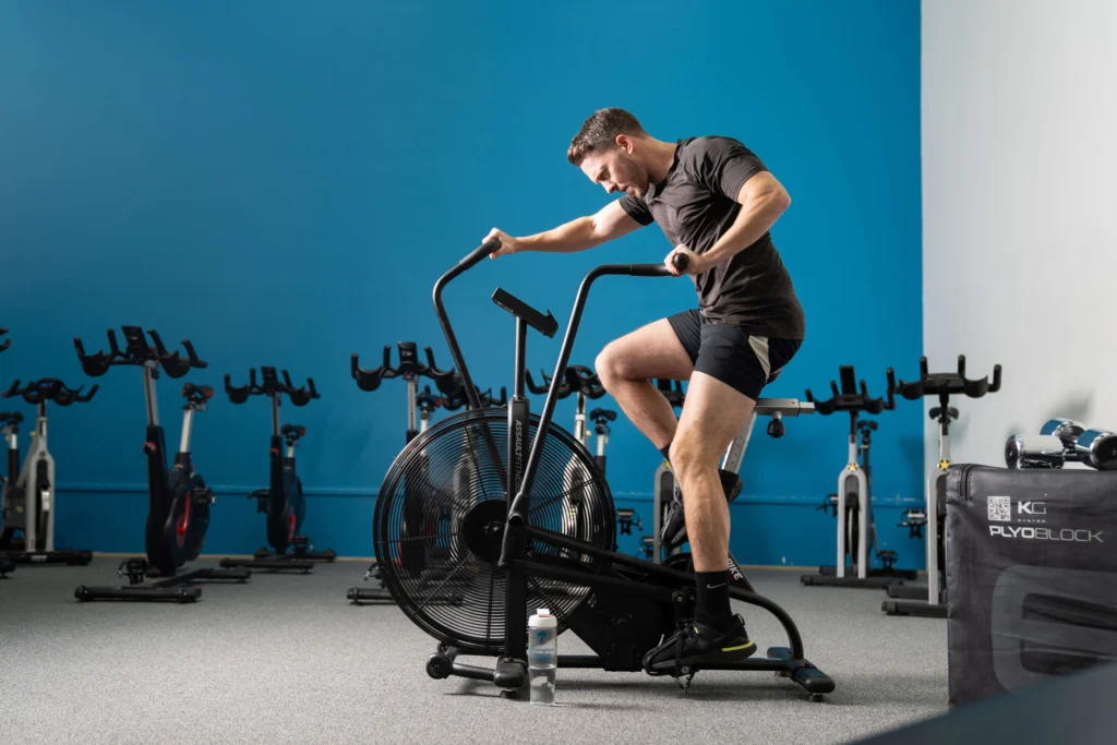 Sport person on exercise bike