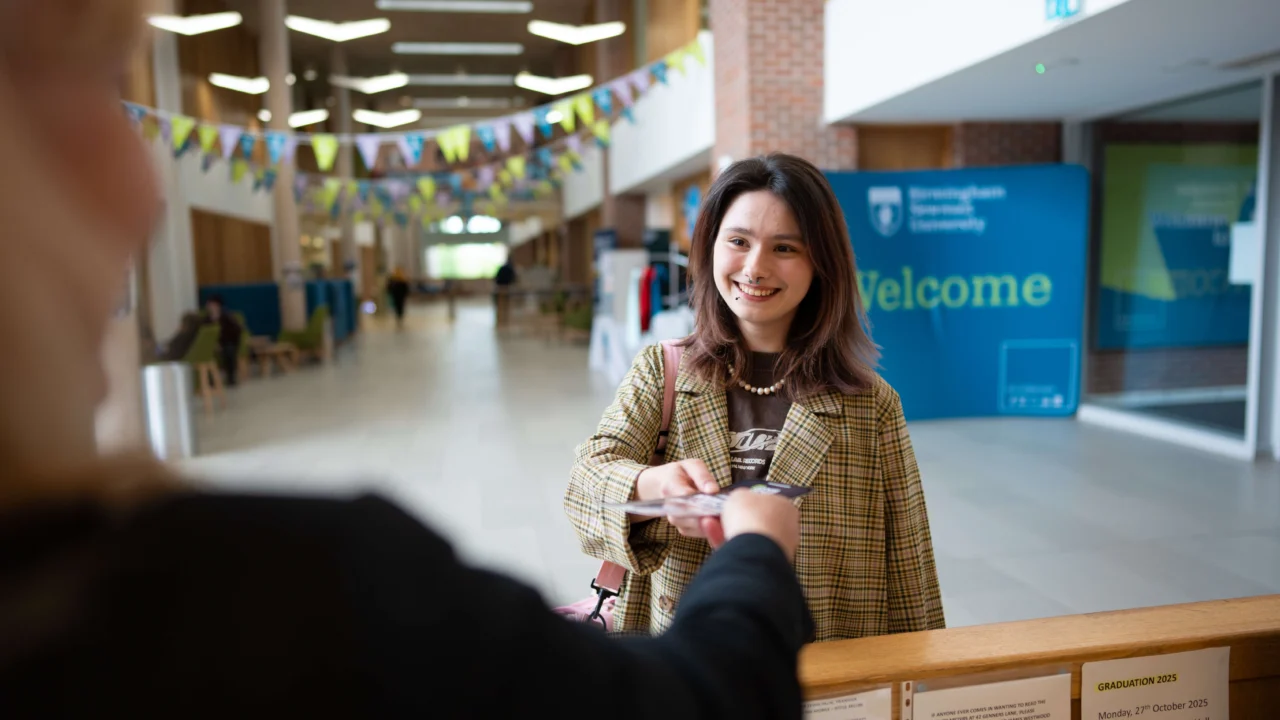 Student at reception desk