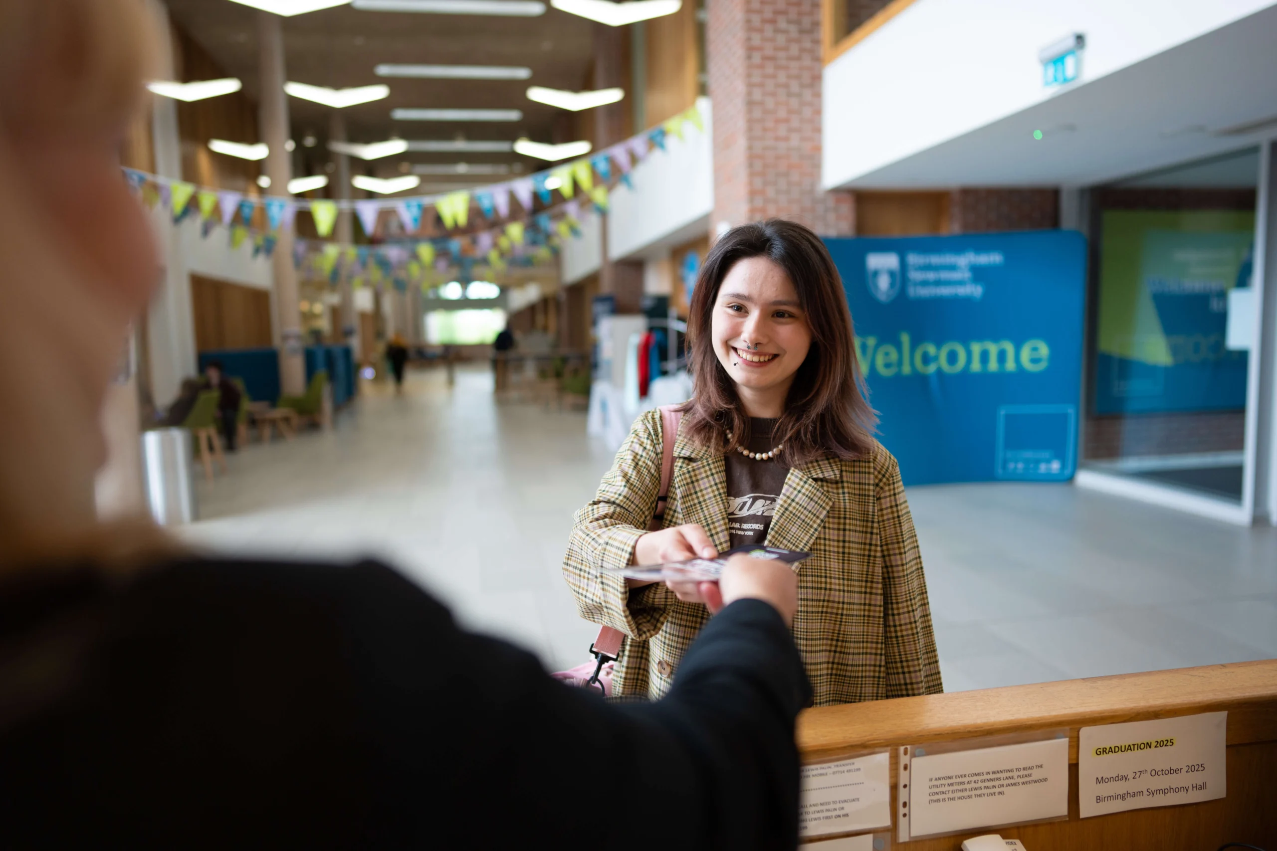 Student at reception desk