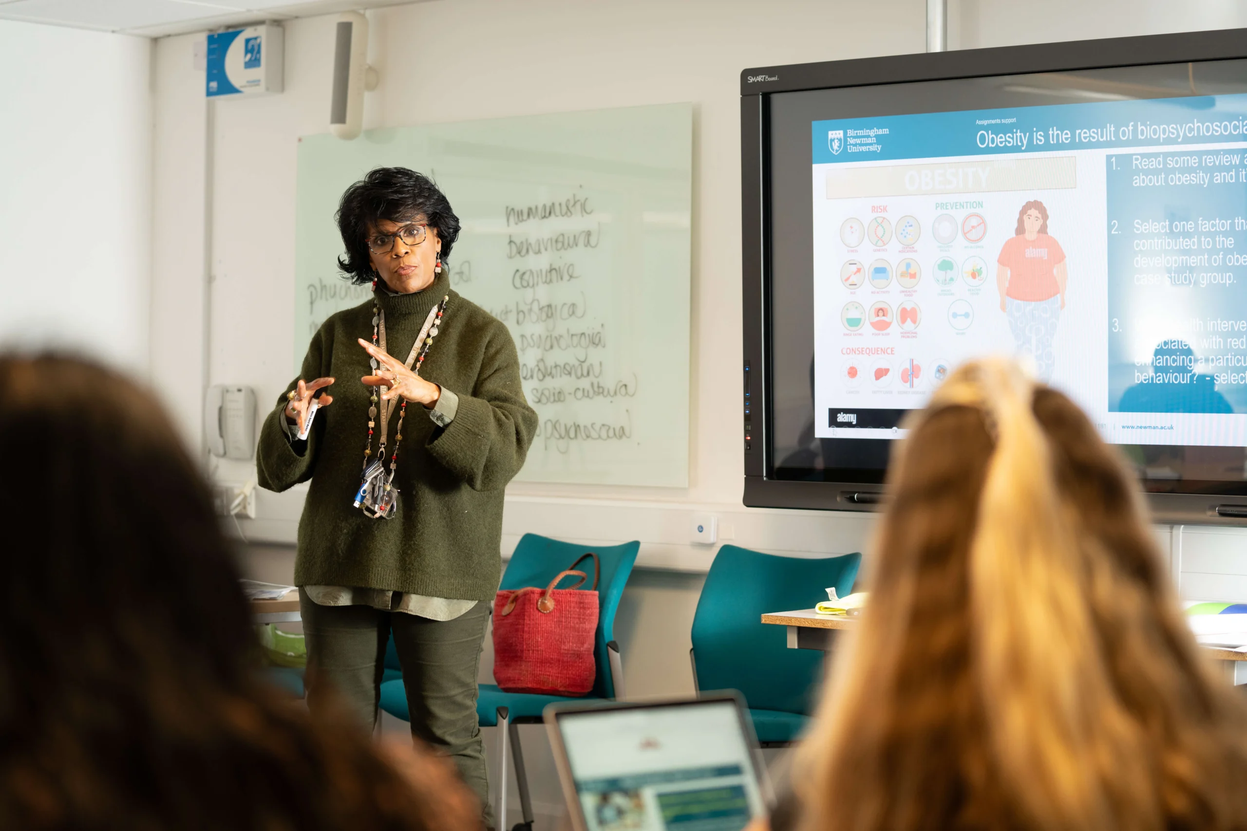 Teacher in class at secondary school