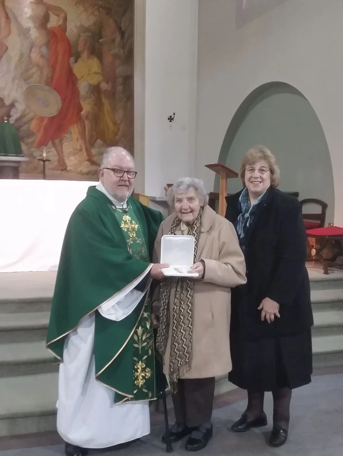 Dr Marie Rowlands, Professor Judith Champ, alongside Fr. Cecil Rogerson, presented Dr Rowlands with the Bene Merenti Medal on 22 February 2020 in recognition of her contribution to Catholic Life and Witness in the Midlands