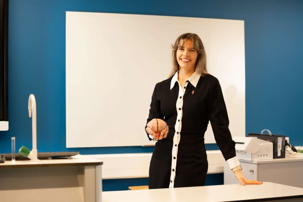 Lecturer with brain model