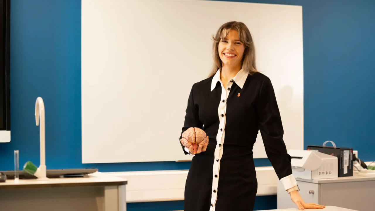 Lecturer with brain model