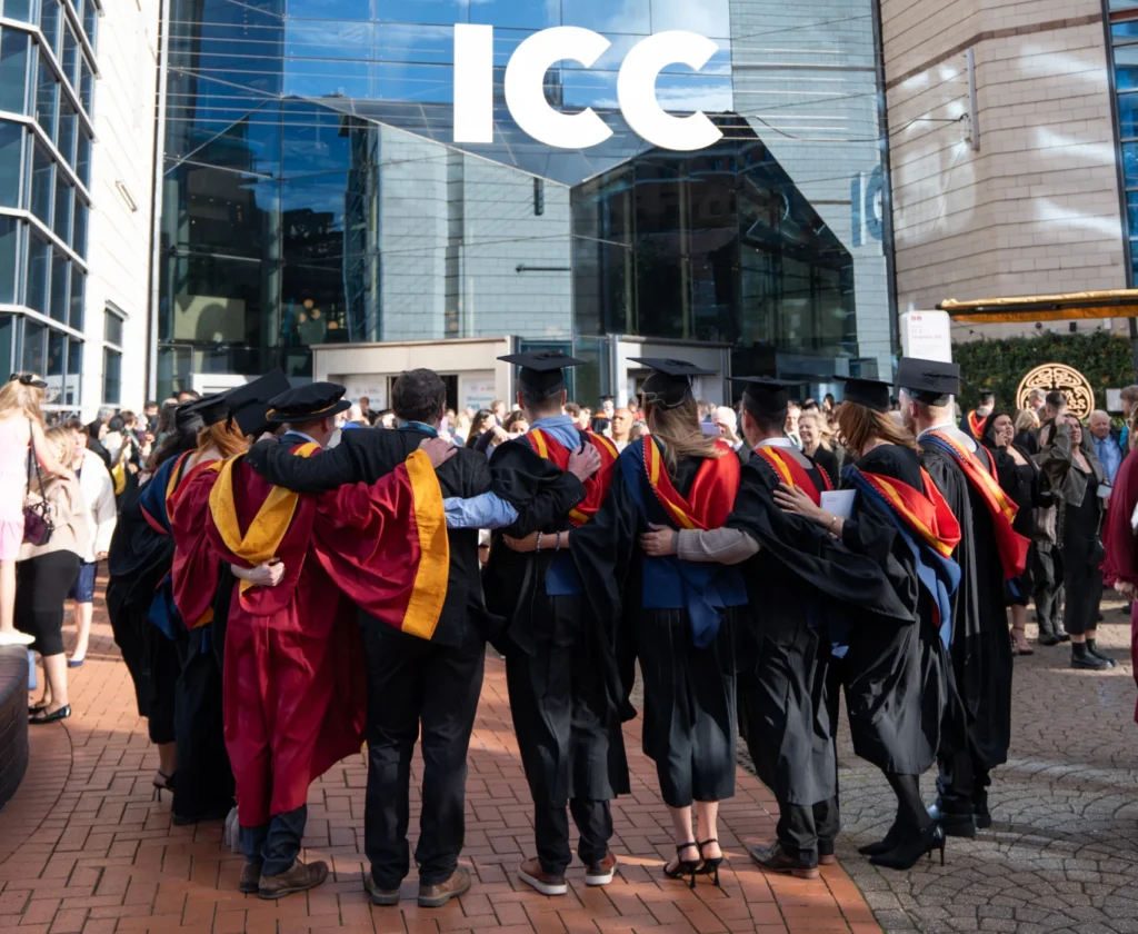 Graduands in gowns outside the ICC