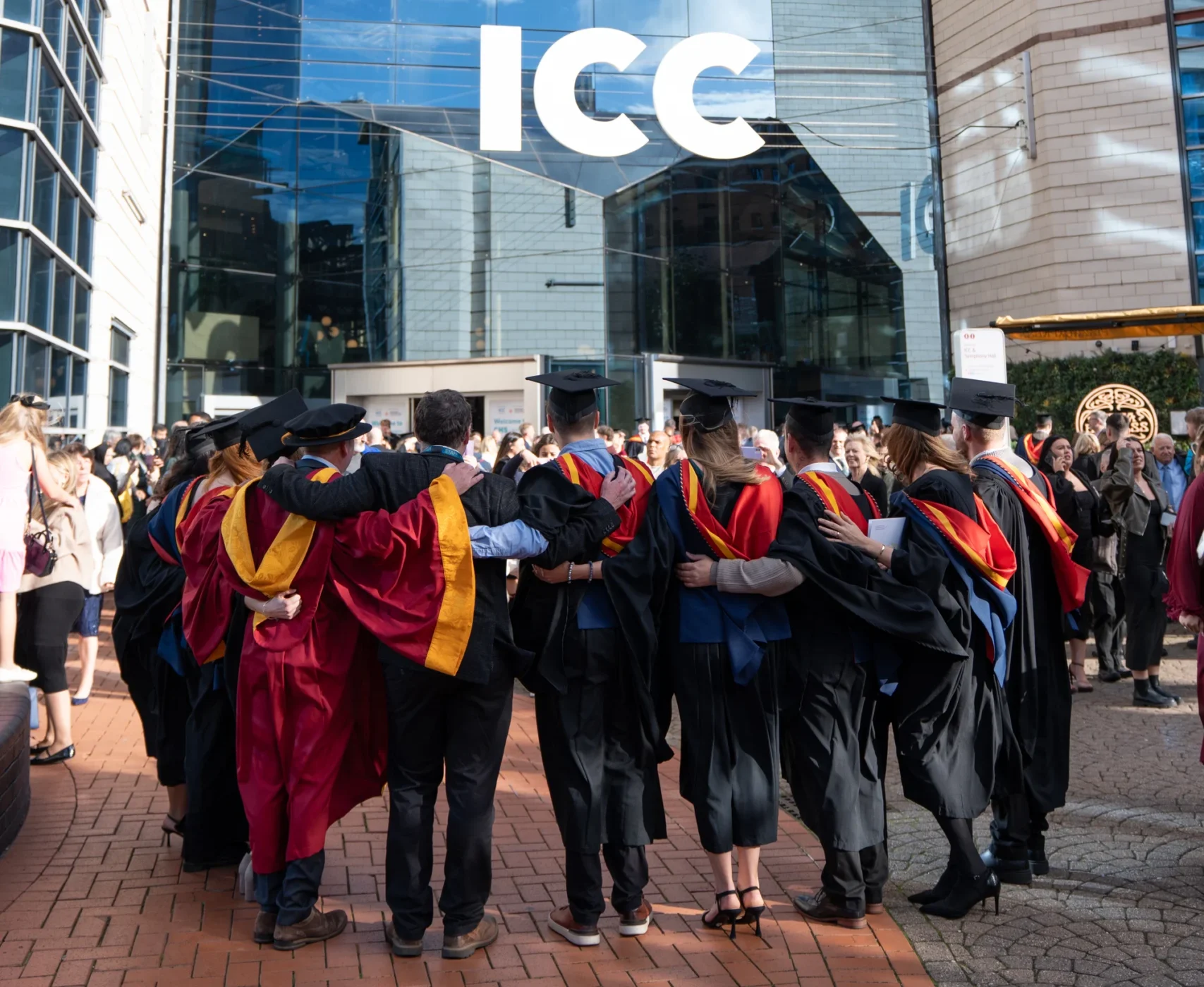 Graduands in gowns outside the ICC