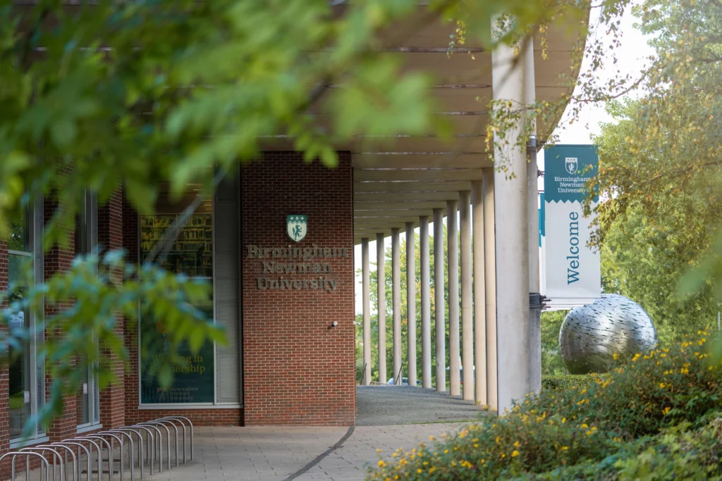 Exterior of Birmingham Newman with globe