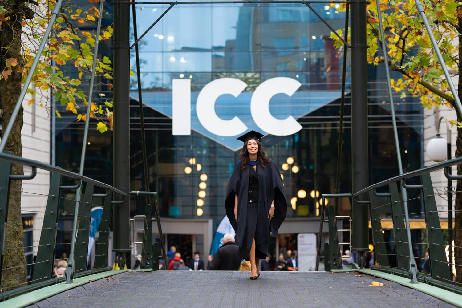 Graduate walking outside Symphony Hall