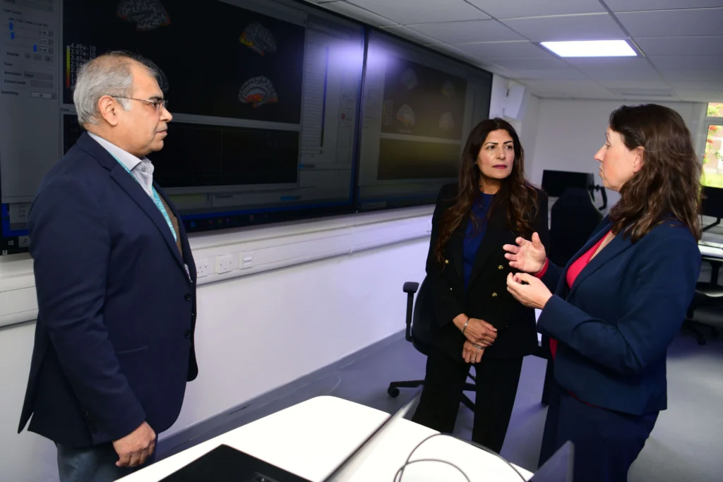 Preet Gill MP talking with Kate Dobson and Dr. Adnan Qureshi in the Digital Learning Hub