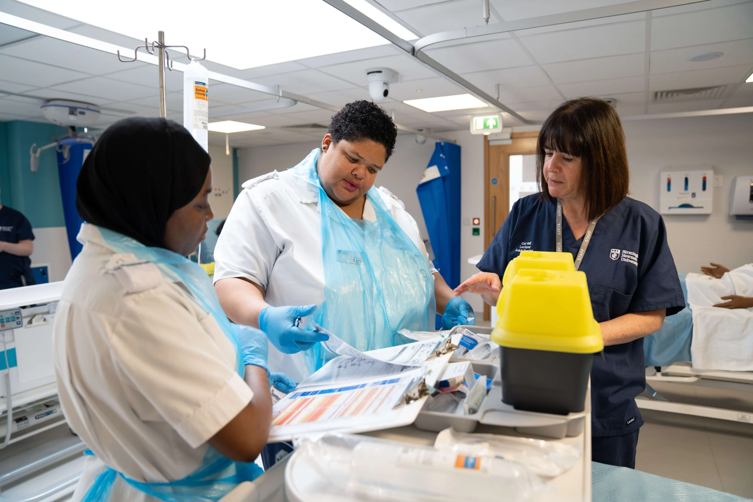 Mental Health Nursing students on a ward talking
