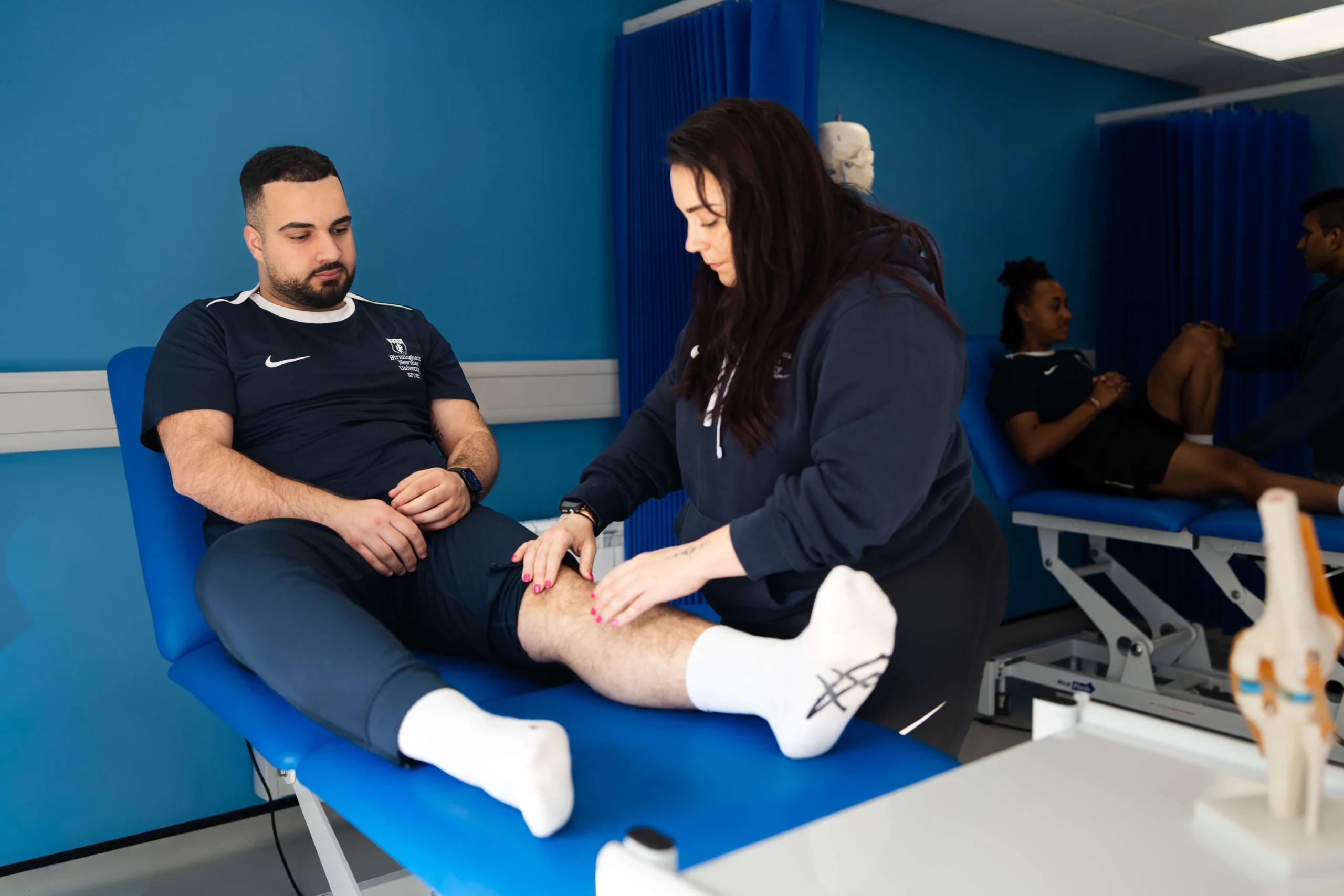 Student having leg treatment on Sports Injury Clinic