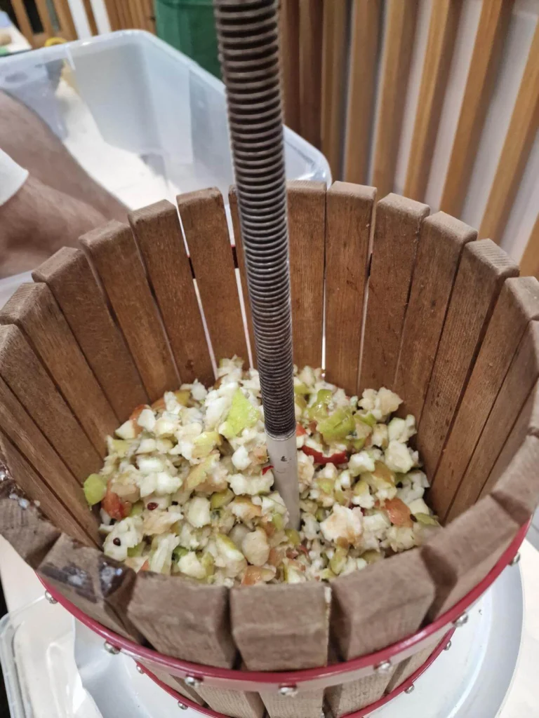Apples being crushed