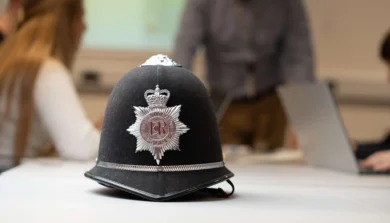 Police helmet on a desk