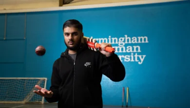Sport student with cricket bat