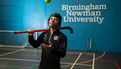 Sport student with hockey stick