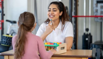 Speech and Language Therapist in a session with a young child